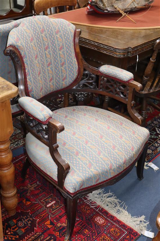 A pair of Victorian armchairs